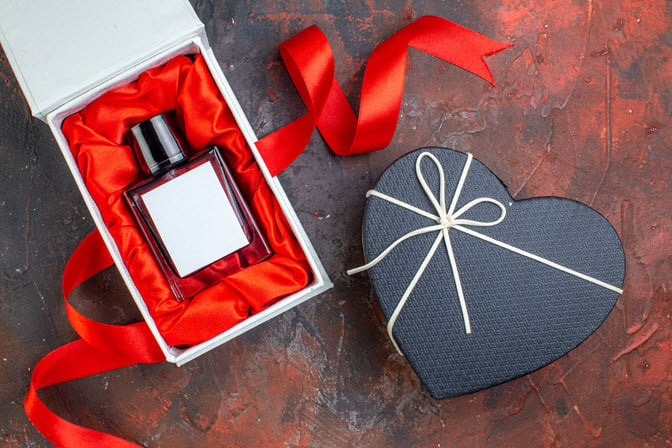 top-view-valentines-day-present-fragnance-dark-surface-gift-perfume-love-feeling-color-couple-happiness-woman.jpg